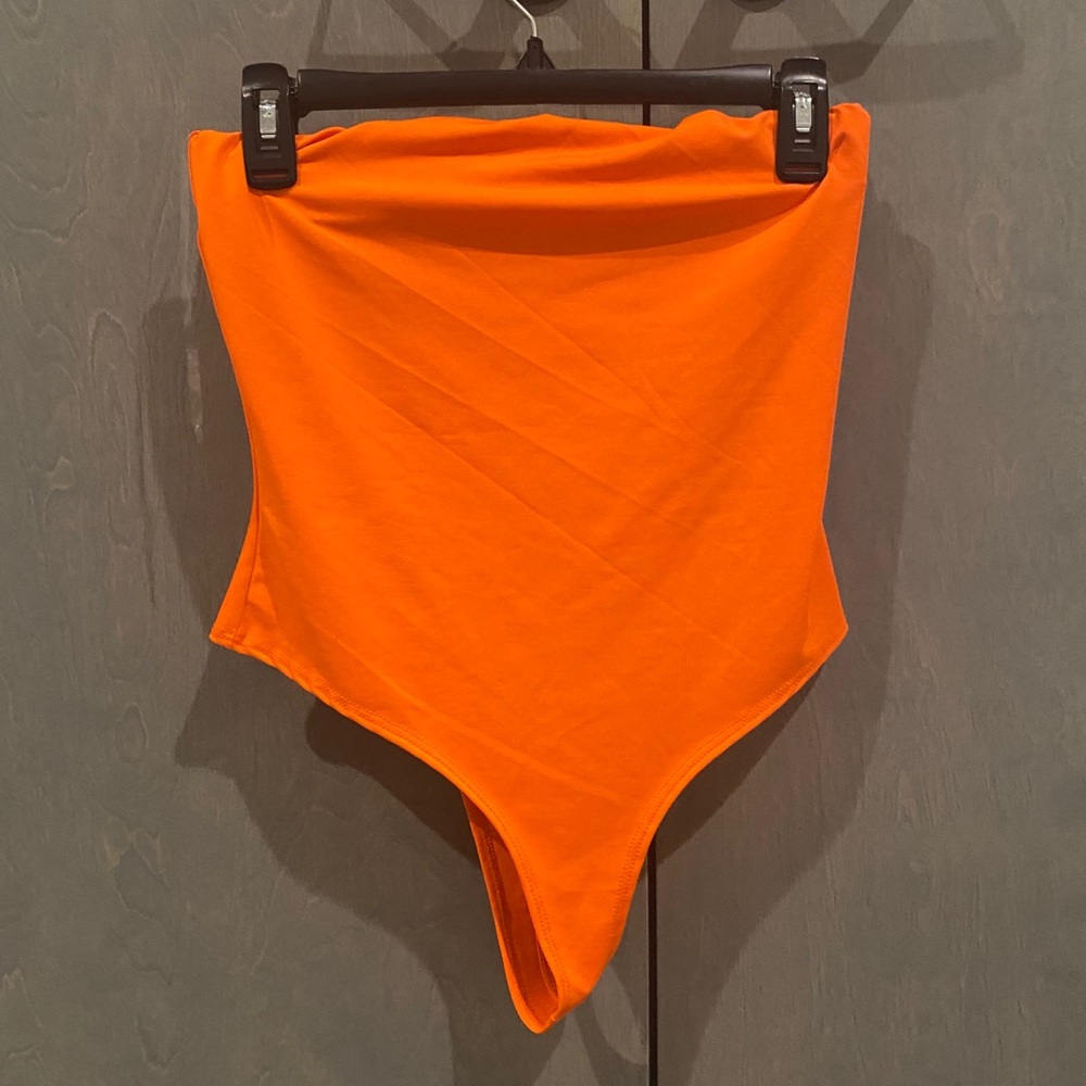 neon orange thing body suit